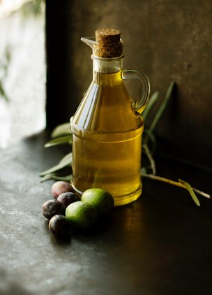 Credit: Roberta Sorge, Unsplash Olive oil bottle