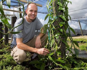 Credit: VSCNews Alan Chambers with vanilla plants at the Tropical Research and Education Center